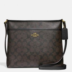 Black and brown Coach cross body